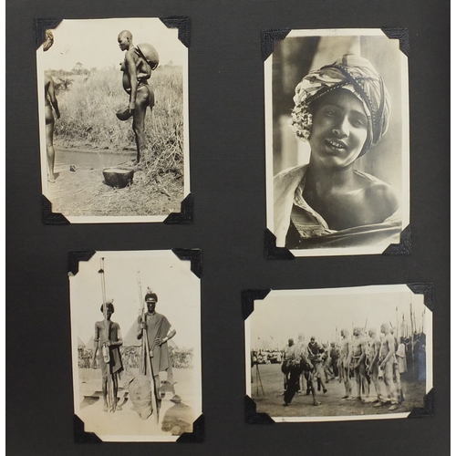 297A - Mostly early 20th century black and white photographs, some Military arranged in two albums includin... 