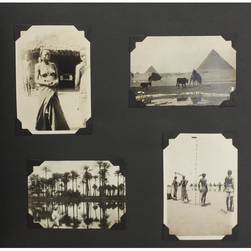 297A - Mostly early 20th century black and white photographs, some Military arranged in two albums includin... 