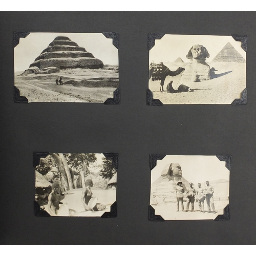 297A - Mostly early 20th century black and white photographs, some Military arranged in two albums includin... 