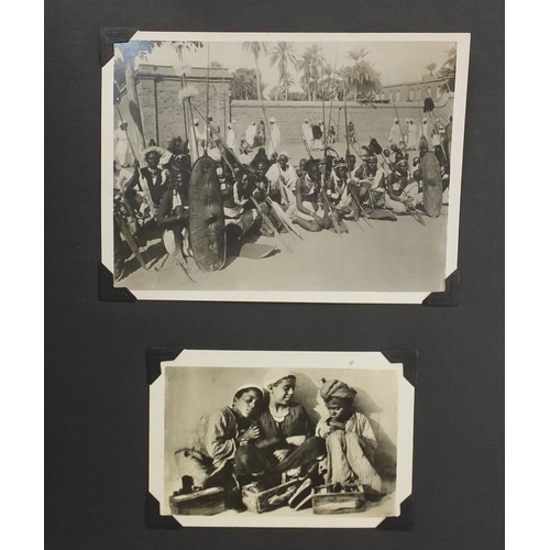 297A - Mostly early 20th century black and white photographs, some Military arranged in two albums includin... 