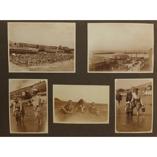 297A - Mostly early 20th century black and white photographs, some Military arranged in two albums includin... 