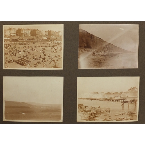 297A - Mostly early 20th century black and white photographs, some Military arranged in two albums includin... 