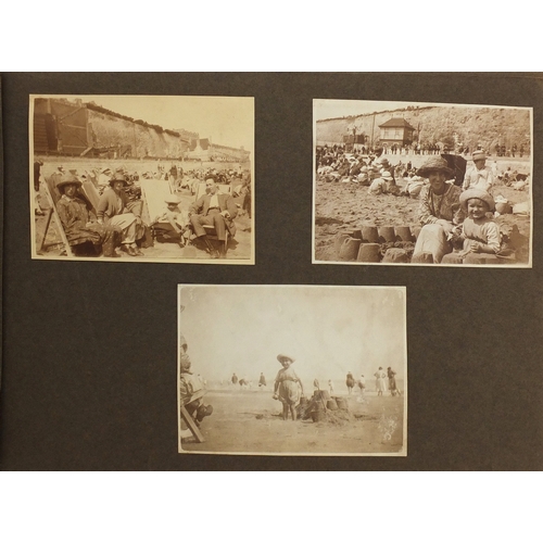 297A - Mostly early 20th century black and white photographs, some Military arranged in two albums includin... 