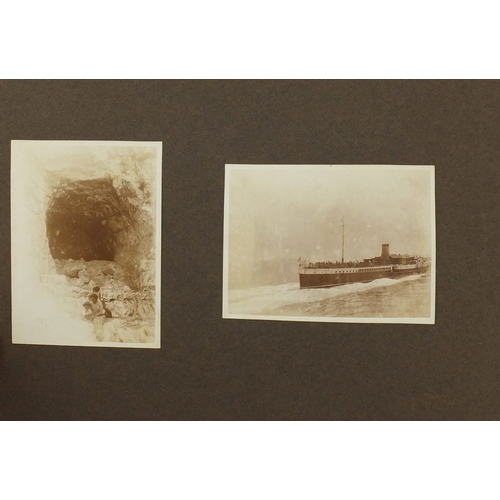 297A - Mostly early 20th century black and white photographs, some Military arranged in two albums includin... 