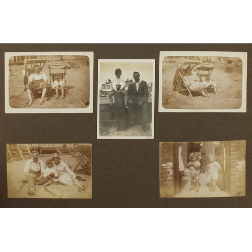 297A - Mostly early 20th century black and white photographs, some Military arranged in two albums includin... 