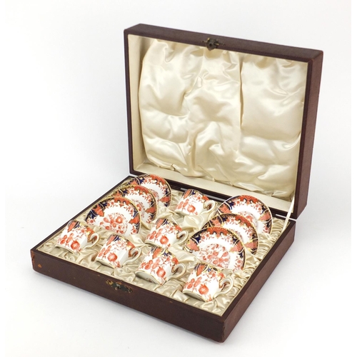 2540 - Set of six Royal Crown Derby Old Imari pattern coffee cans and saucers, housed in a silk lined fitte... 