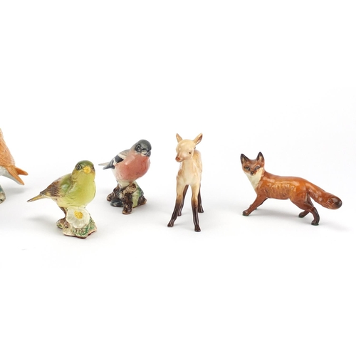 2566 - Nine Beswick animals including an owl, bullfinch and a fox, the largest 12cm high