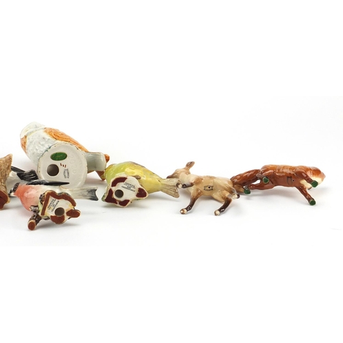 2566 - Nine Beswick animals including an owl, bullfinch and a fox, the largest 12cm high