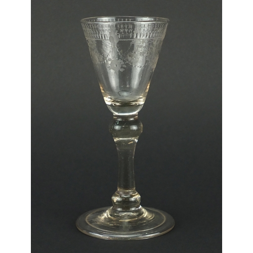 742 - Antique clear glass, with folded foot etched with flowers and swags, 15.5cm high