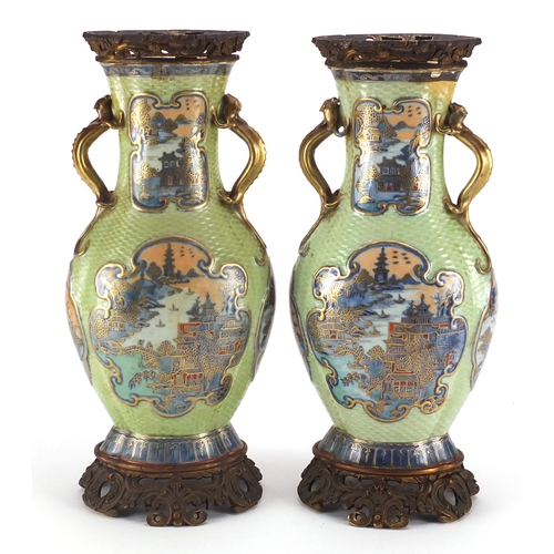 415 - Pair of Chinese porcelain green ground vases with gilt metal mounts and twin handles, each hand pain... 