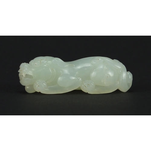 525 - Good Chinese pale celadon jade carving of a Foo Dog, 5.5cm in length