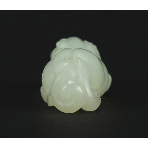 525 - Good Chinese pale celadon jade carving of a Foo Dog, 5.5cm in length
