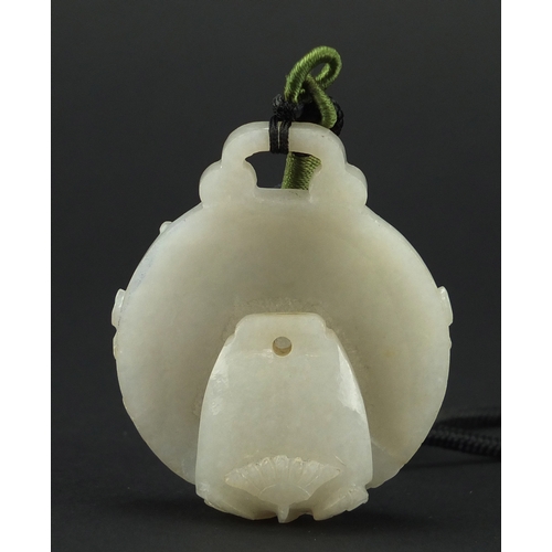 524 - Chinese white jade belt hook, finely carved with flowers, 6cm high