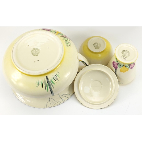 2304 - Art Deco bathroom set hand painted with flowers, by Burleigh Ware including a jug with basin and two... 