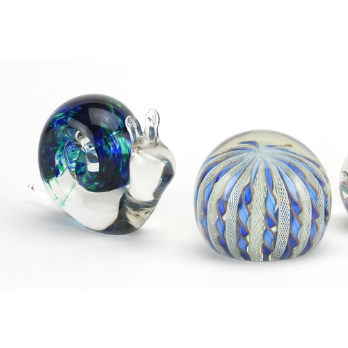 2344 - Four glass paperweights including Wedgwood snail and owl examples, the largest 12cm high