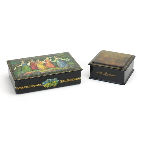 2821 - Two Russian papier-mâché lacquered boxes, one hand painted with five young females, the other with a... 