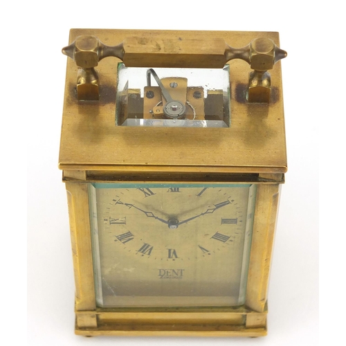 2284 - Brass cased carriage clock retailed by Dent of London, the back plate impressed KJB, 9.5cm high