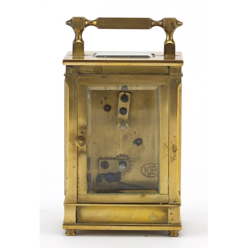 2284 - Brass cased carriage clock retailed by Dent of London, the back plate impressed KJB, 9.5cm high