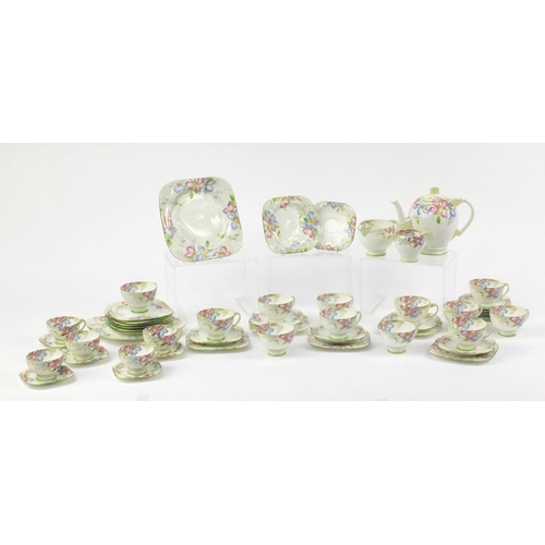 2168 - Art Deco teaware by Paragon decorated in the Clematis pattern, a replica of the service produced for... 