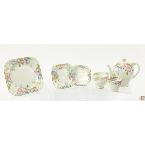 2168 - Art Deco teaware by Paragon decorated in the Clematis pattern, a replica of the service produced for... 