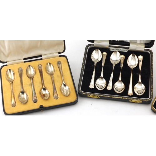 2877 - Three sets of silver teaspoons including Walker & Hall, each with fitted boxes, approximate weight 1... 