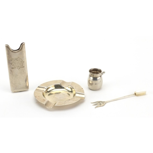 2855 - Silver objects including an ashtray, pickle fork and rectangular case, various hallmarks, the larges... 