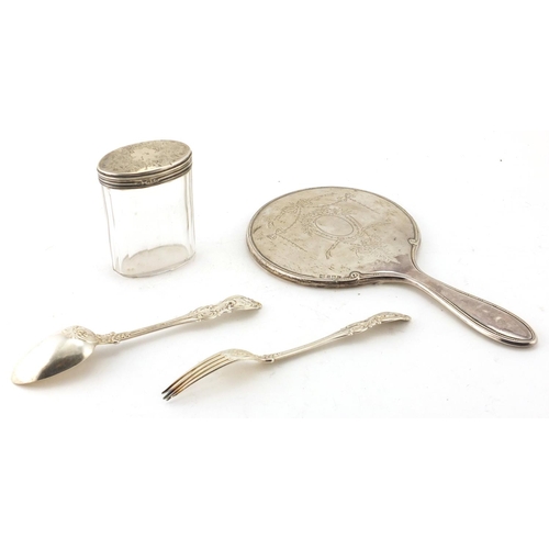 2866 - Silver items comprising Victorian Christening fork and spoon, hand mirror and cut glass jar with sil... 