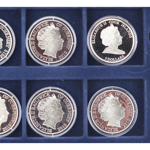 2796 - Seven silver proof Battle of Britain five pound coins and a two pound example