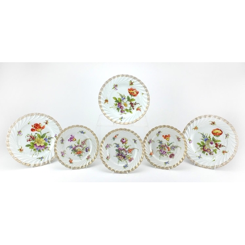 2231 - Six Dresden porcelain plates, hand painted with flowers, the largest 22cm in diameter