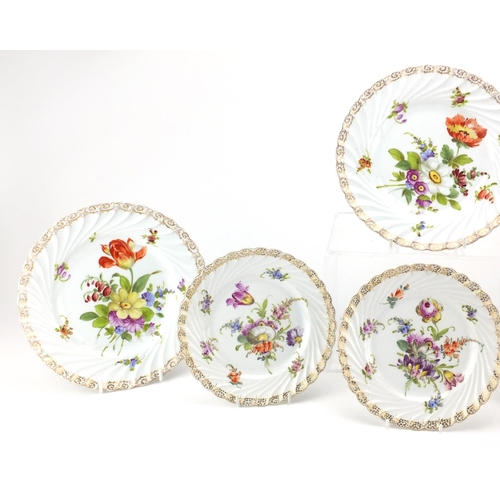 2231 - Six Dresden porcelain plates, hand painted with flowers, the largest 22cm in diameter