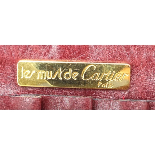 2700 - 1950's Cartier red leather shoulder bag, 27.5cm wide