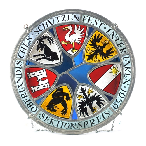 2175 - Circular German leaded stain glass panel, hand painted with coats of arms, 26.5cm in diameter