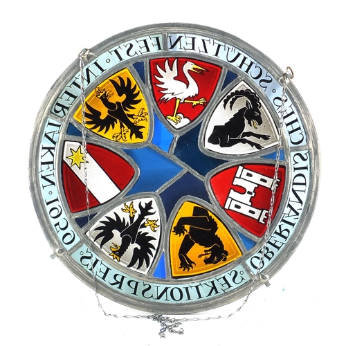 2175 - Circular German leaded stain glass panel, hand painted with coats of arms, 26.5cm in diameter