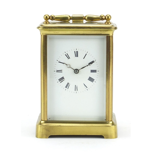 2267 - Large brass cased carriage clock with enamelled dial, roman numerals and travelling case, 13.5cm hig... 