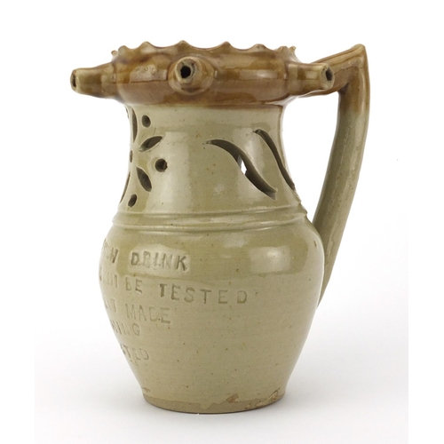 2431 - 19th century salt glazed puzzle jug with impressed motto, 'Gentleman drink and Let your skill be tes... 