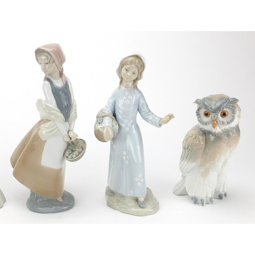 2619 - Three Nao figures, an owl and two others, the largest 25cm high