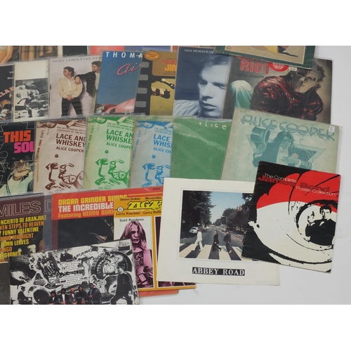 2678 - Vinyl LP's and programmes including The Beatles, The Police, Strawbs, Miles Davies, Yes, Alice Coope... 