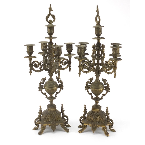 2190 - Pair of ornate gilt brass five branch candelabras, each 52cm high
