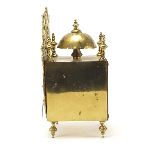 2295 - 17th style ornate brass lantern mantel clock striking on a bell, with enamelled Roman numerals, the ... 