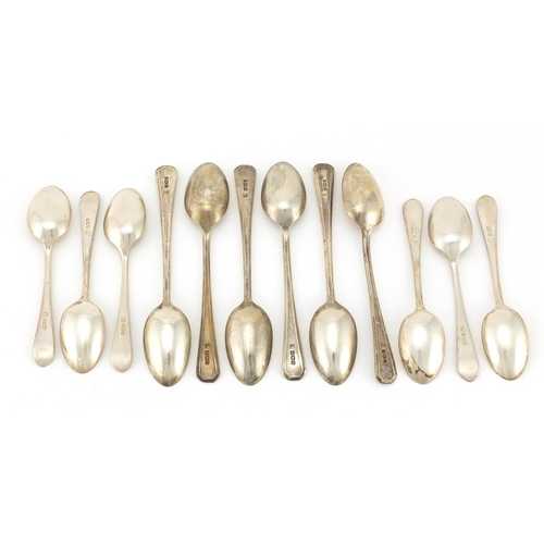 2870 - Two sets of six silver teaspoons, Sheffield hallmarks, the largest 13cm in length, approximate weigh... 
