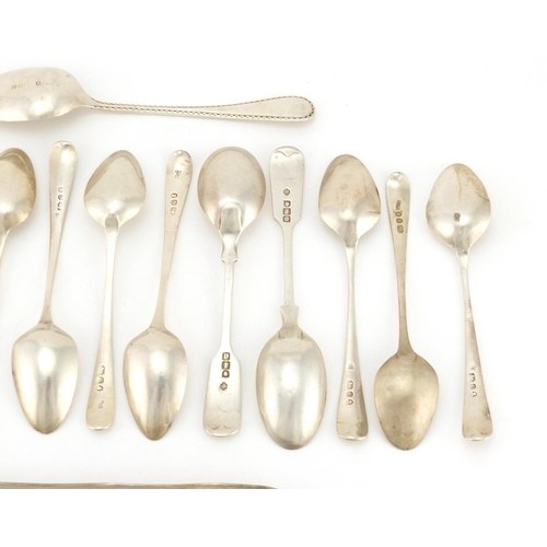 2869 - Thirteen Georgian and later silver spoons and pair of bright cut sugar tongs, various hallmarks, the... 