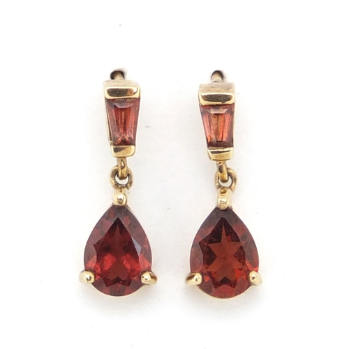 3054 - Pair of 9ct gold garnet tear drop earrings, 1.5cm in length, approximate weight 1.4g