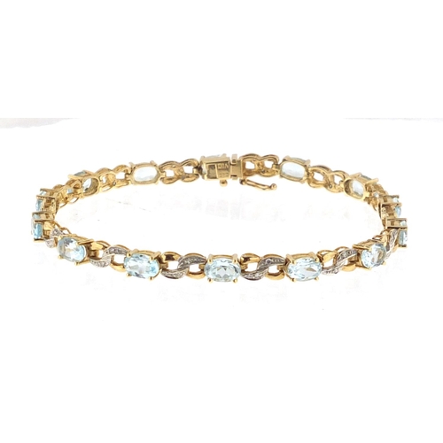 2887 - 9ct gold blue stone and diamond bracelet, 18cm in length, approximate weight 8.7g