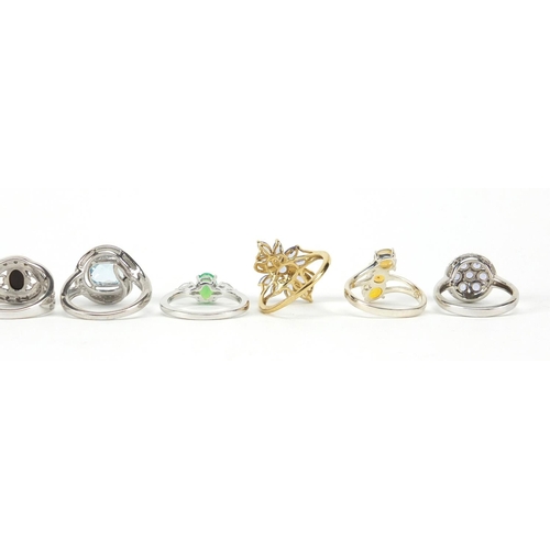 3061 - Ten silver semi precious stone rings, various sizes, approximate weight 26.9g