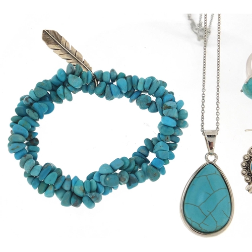 3044 - Silver an turquoise jewellery comprising bracelet, two rings, two pairs of earrings and pendant on c... 