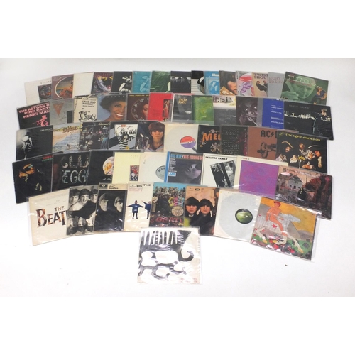 2664 - Vinyl LP's and programmes including Black Sabbath Vertigo Swirl, The Beatles, Fleetwood Mac, AC DC, ... 