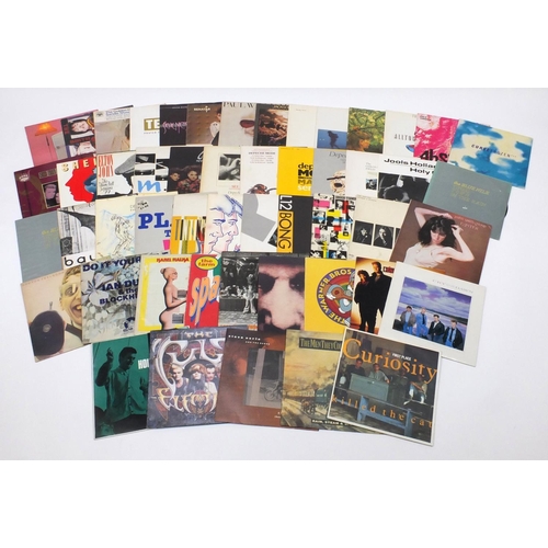 2670 - Twelve inch vinyl LP's including Echo & the Bunnymen, Cure, Ian Dury and Texas