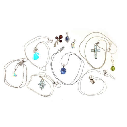 3042 - Ten silver semi precious stone pendants, six with silver necklaces, approximate weight 32.0g