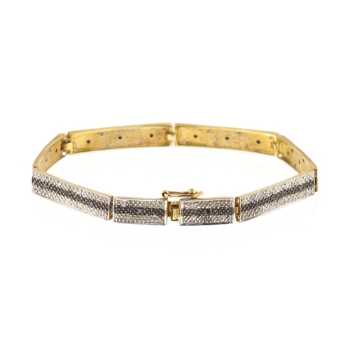 2889 - 9ct gold black and white diamond three row bracelet, 17cm in length, approximate weight 8.0g