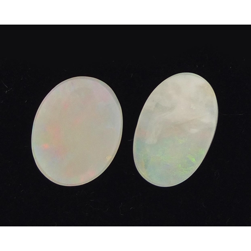 3087 - Two cabochon opals, each approximately 1.3cm in length
